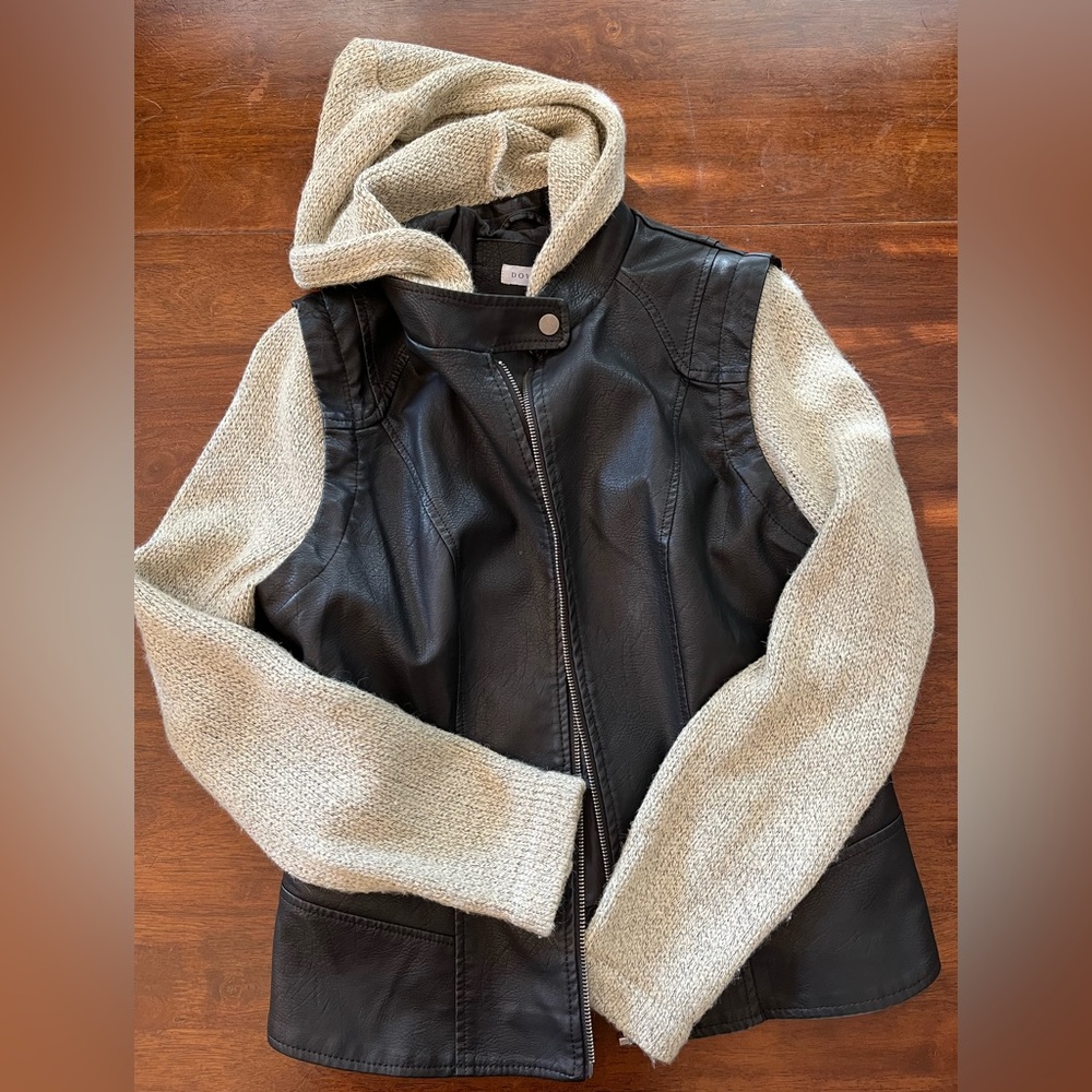 Black fashion jacket. Worn moderately for two seasons, in very good condition.